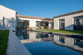 Maison familiale neuve avec piscine chauffée